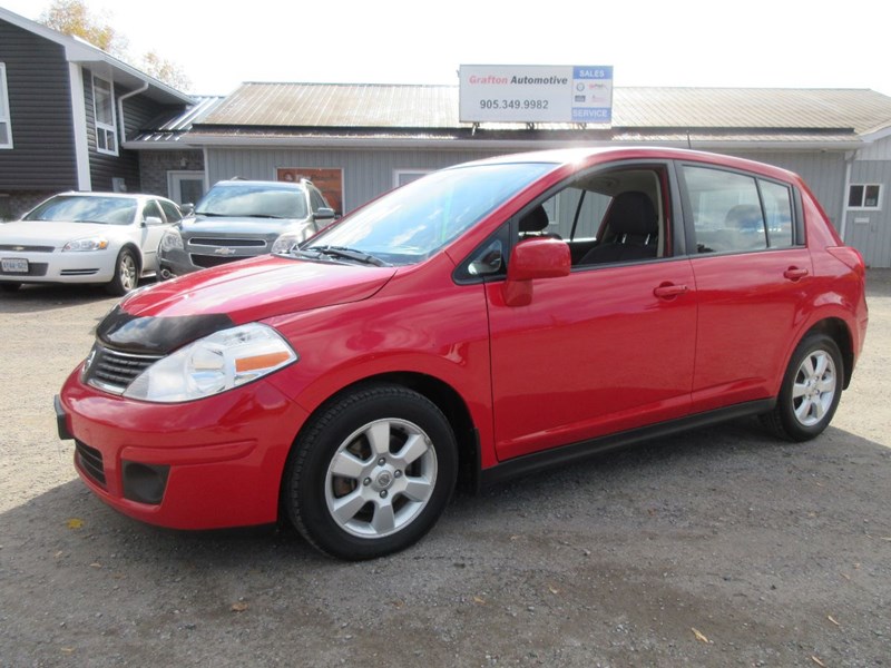 2009 red nissan versa