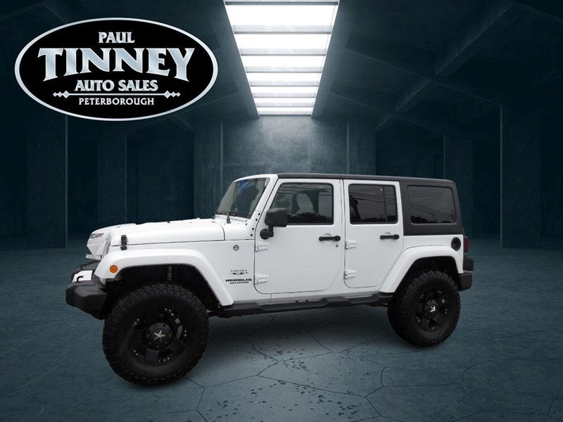 Photo of  2016 Jeep Wrangler Unlimited Sahara for sale at Paul Tinney Auto in Peterborough, ON