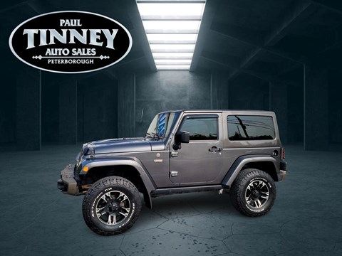 Photo of 2017 Jeep Wrangler Sahara  for sale at Paul Tinney Auto in Peterborough, ON