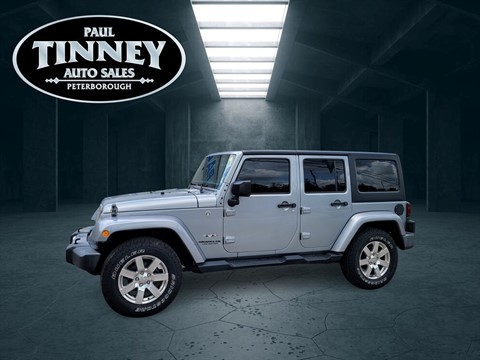 Photo of 2016 Jeep Wrangler Unlimited Sahara for sale at Paul Tinney Auto in Peterborough, ON