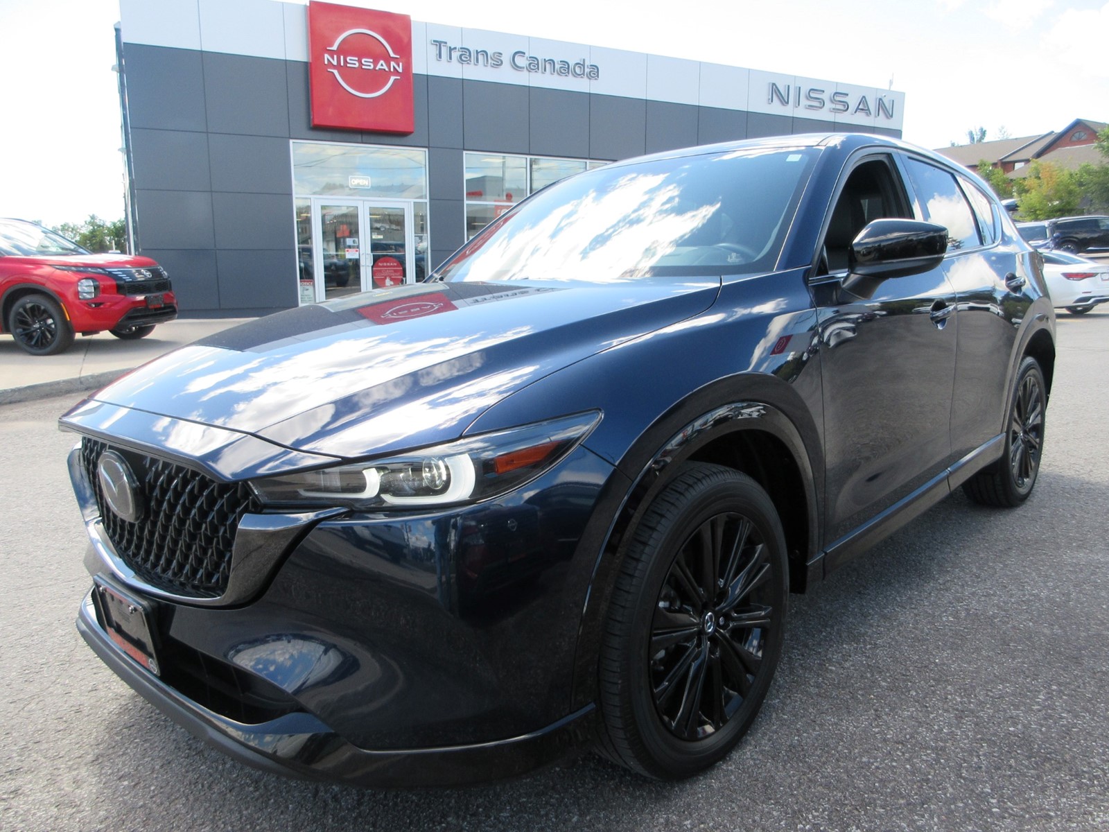 Photo of 2024 Mazda CX-5 Premium AWD for sale at Trans Canada Nissan in Peterborough, ON