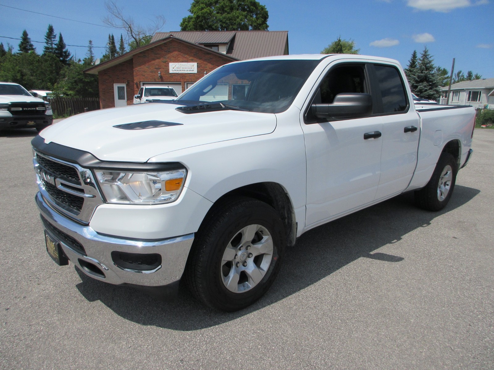 Photo of 2024 RAM 1500 SXT Quad Cab for sale at R & B Auto Sales in Omemee, ON