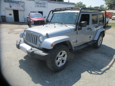 Photo of 2014 Jeep Wrangler Unlimited Sahara for sale at Paradise Auto Source in Peterborough, ON