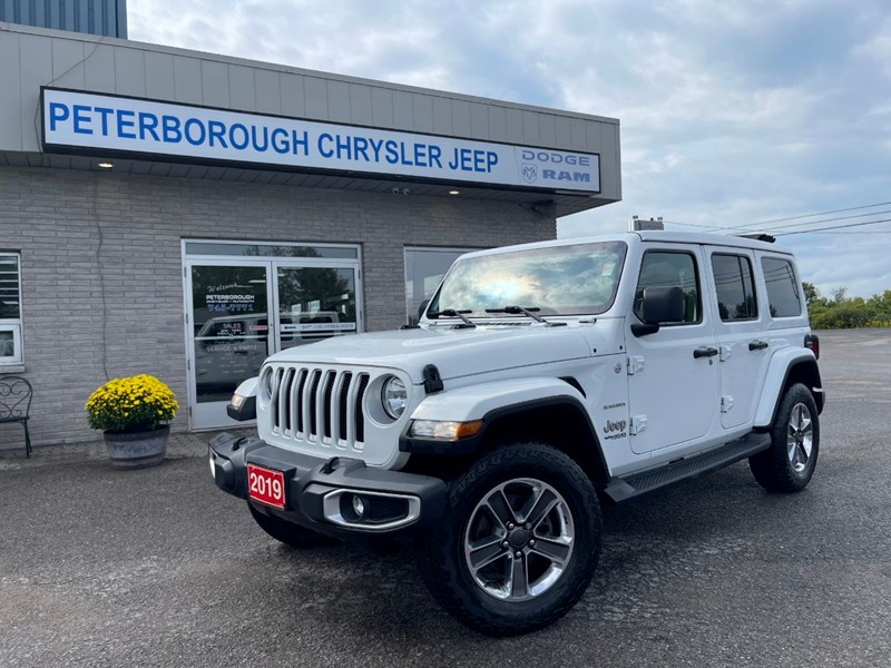 Photo of  2019 Jeep Wrangler Unlimited Sahara for sale at Peterborough Chrysler in Peterborough, ON