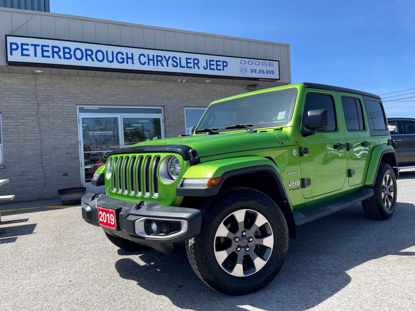 Photo of 2019 Jeep Wrangler Unlimited Sahara for sale at Peterborough Chrysler in Peterborough, ON