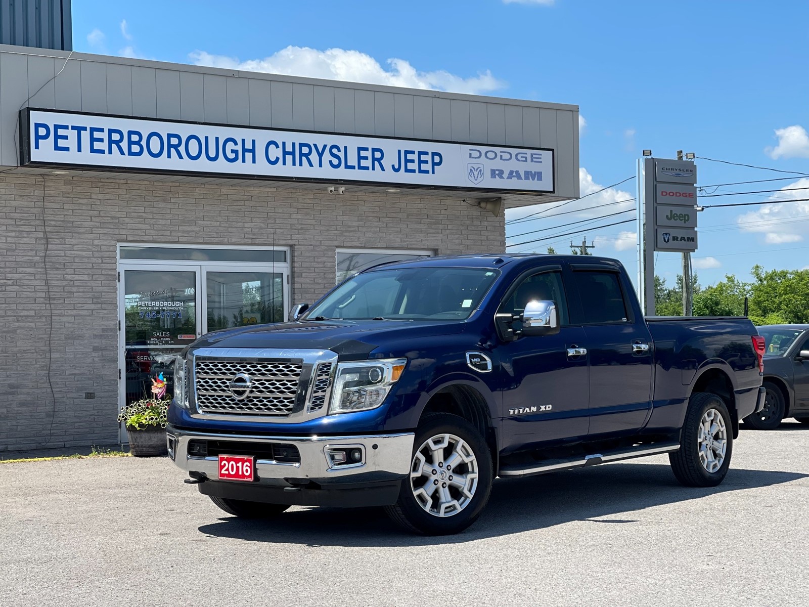Photo of 2016 Nissan Titan XD SL 4WD for sale at Peterborough Chrysler in Peterborough, ON