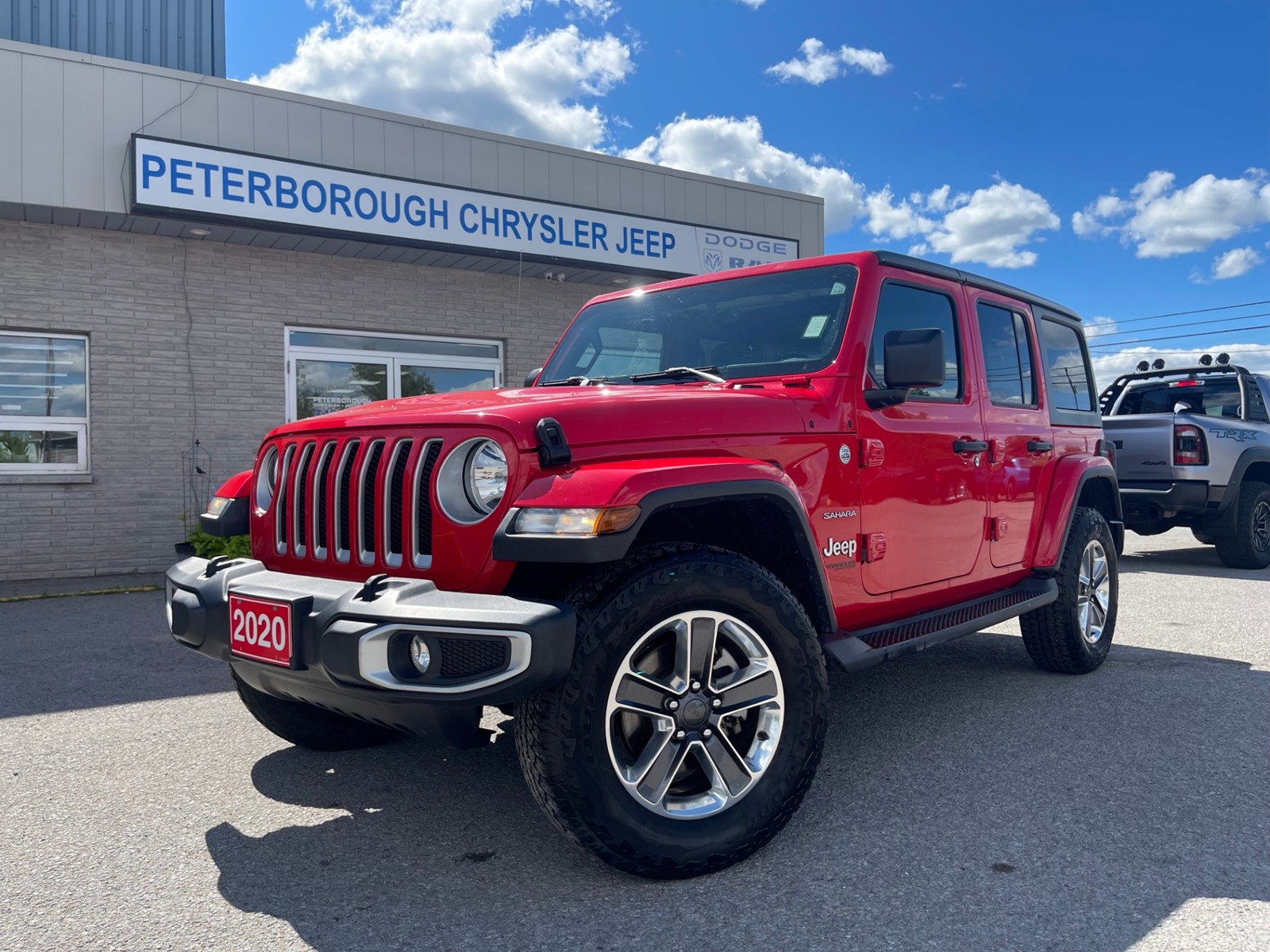 Photo of 2020 Jeep Wrangler Unlimited Sahara for sale at Peterborough Chrysler in Peterborough, ON