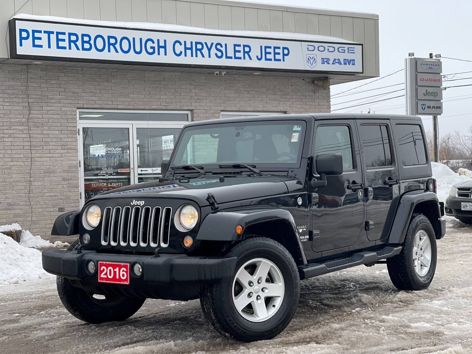 Photo of 2016 Jeep Wrangler Unlimited Sahara for sale at Peterborough Chrysler in Peterborough, ON