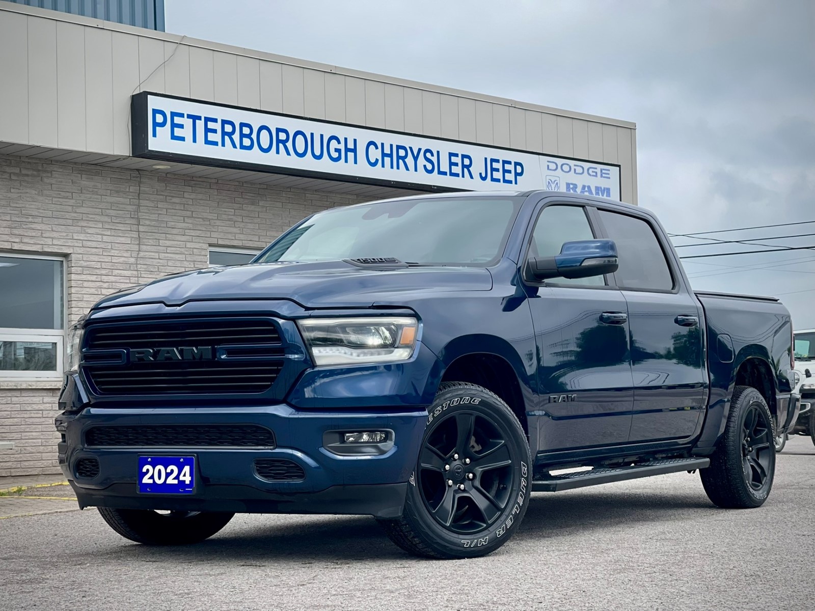 Photo of 2024 RAM 1500 Sport Crew Cab for sale at Peterborough Chrysler in Peterborough, ON