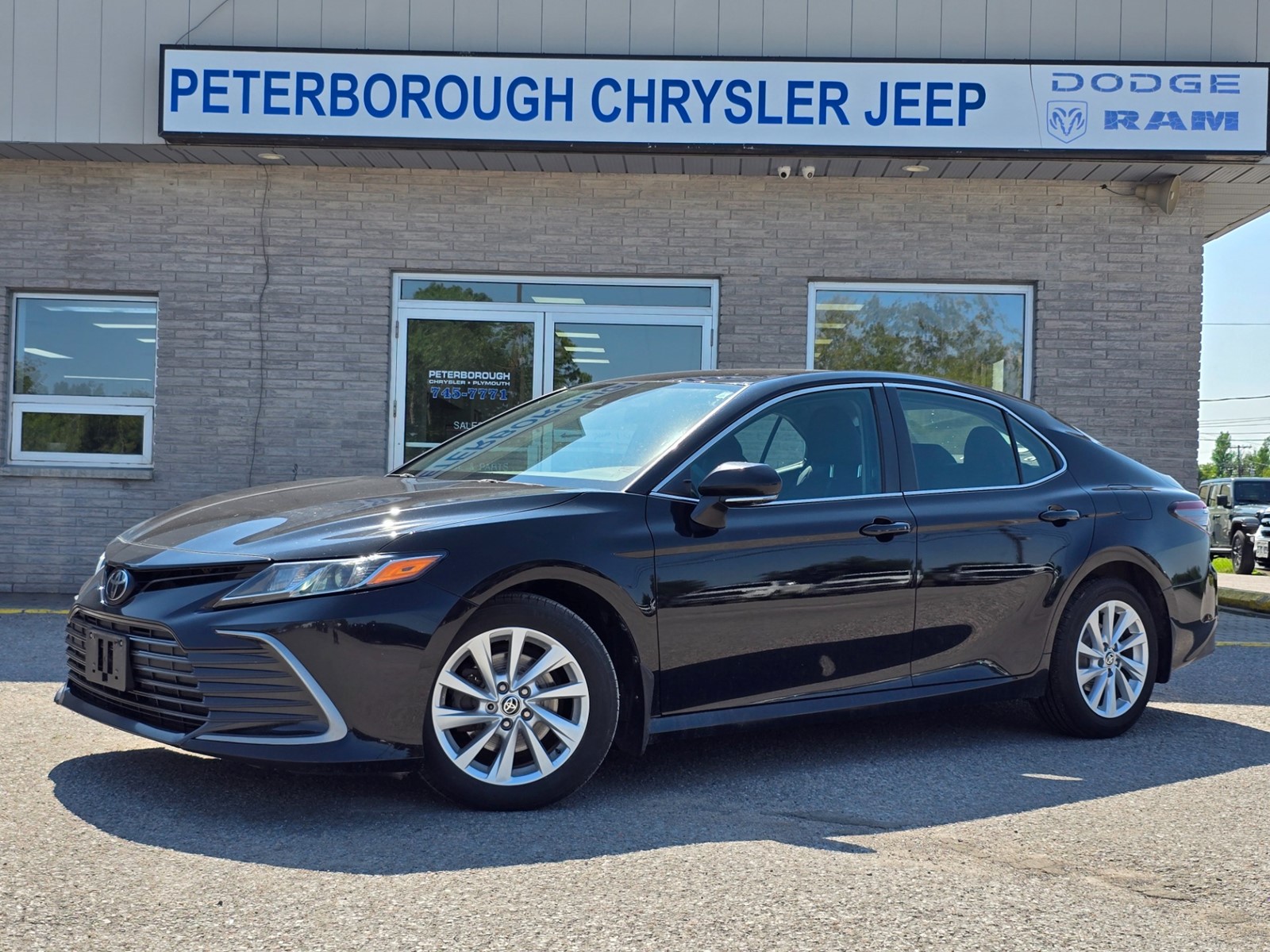 Photo of 2021 Toyota Camry LE AWD for sale at Peterborough Chrysler in Peterborough, ON