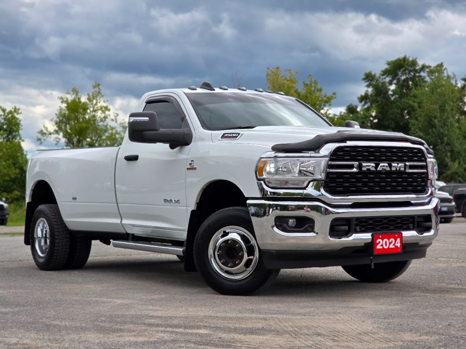 Photo of 2024 RAM 3500 Big Horn Regular Cab 4WD Drw for sale at Peterborough Chrysler in Peterborough, ON
