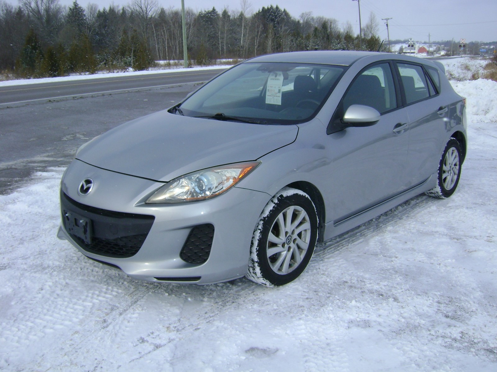 Photo of 2013 Mazda MAZDA3 i Touring for sale at Realistic Auto Sales in Cavan Monaghan, ON