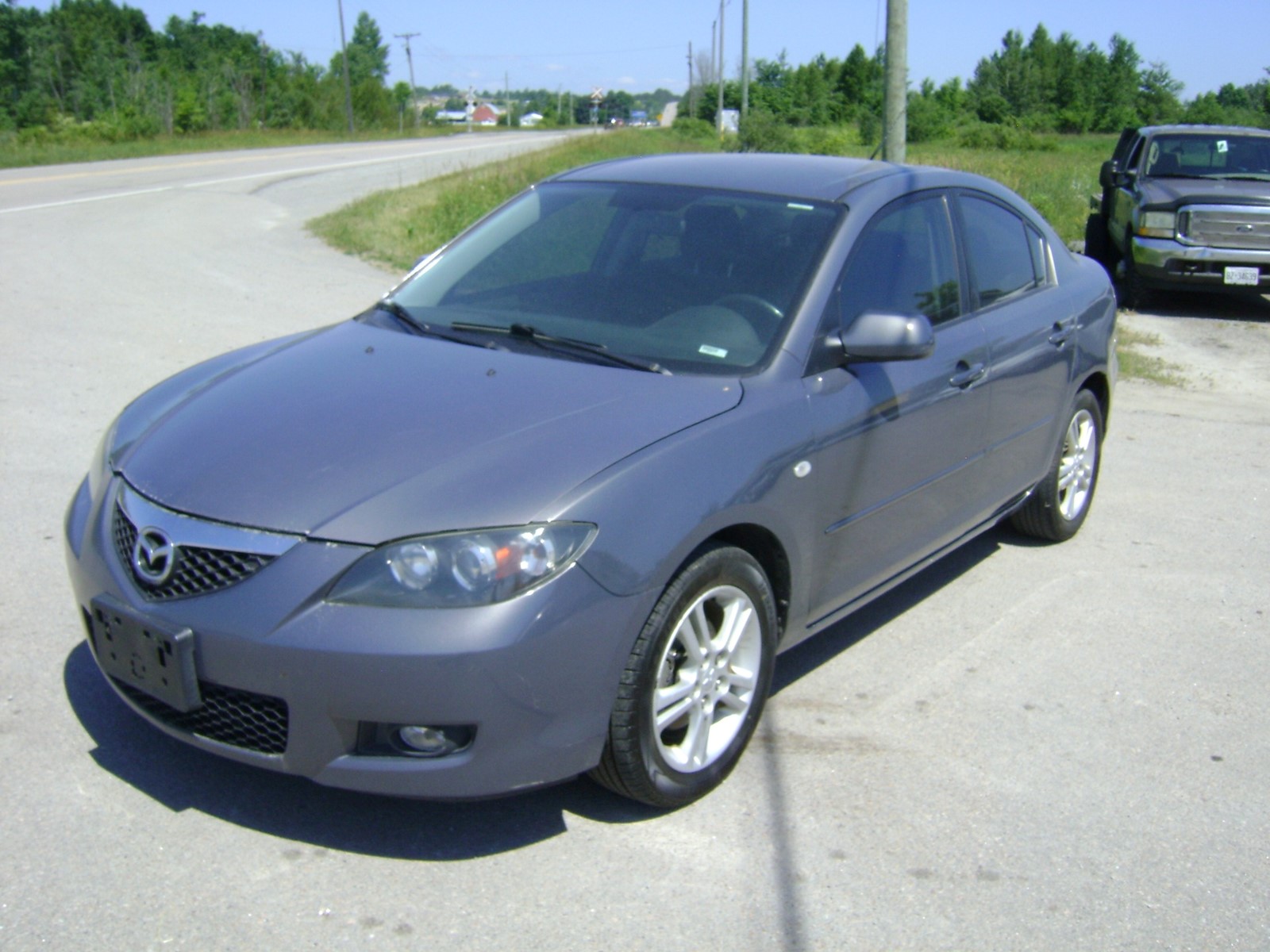 Photo of 2009 Mazda MAZDA3 i Touring Value for sale at Realistic Auto Sales in Cavan Monaghan, ON