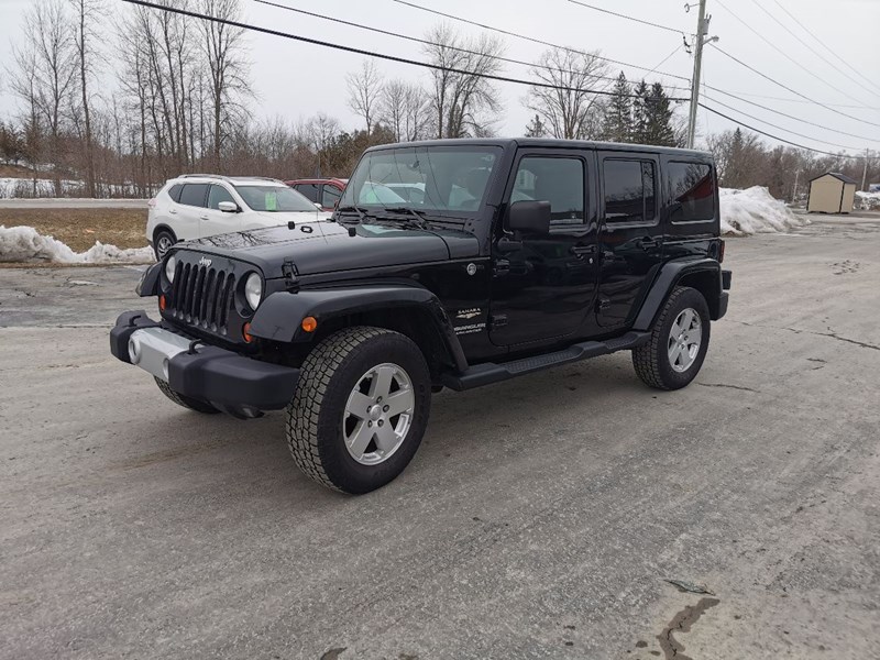 Photo of  2011 Jeep Wrangler Unlimited Sahara for sale at Patterson Auto Sales in Madoc, ON