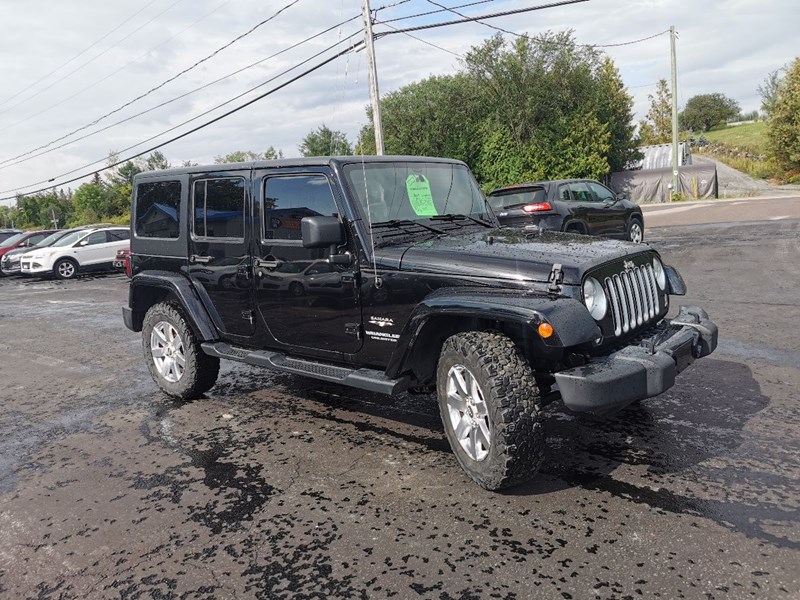 Photo of  2016 Jeep Wrangler Unlimited Sahara for sale at Patterson Auto Sales in Madoc, ON