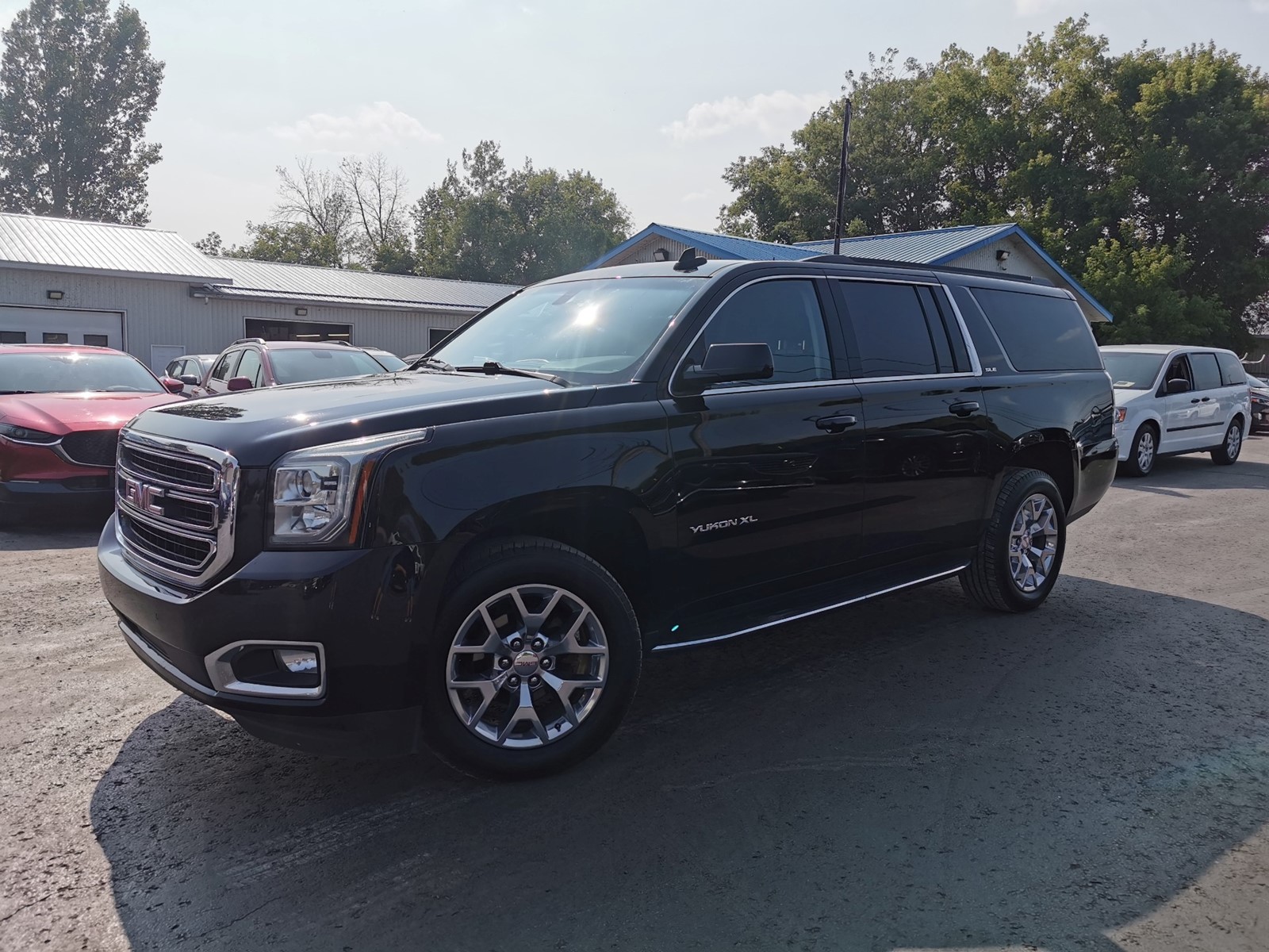 Photo of 2020 GMC Yukon XL SLE  for sale at Patterson Auto Sales in Madoc, ON