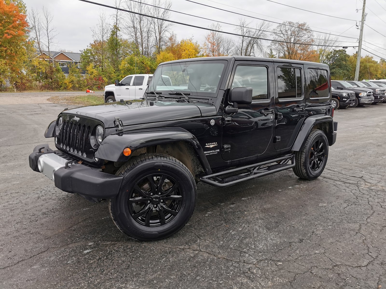 Photo of 2014 Jeep Wrangler Unlimited Sahara for sale at Patterson Auto Sales in Madoc, ON