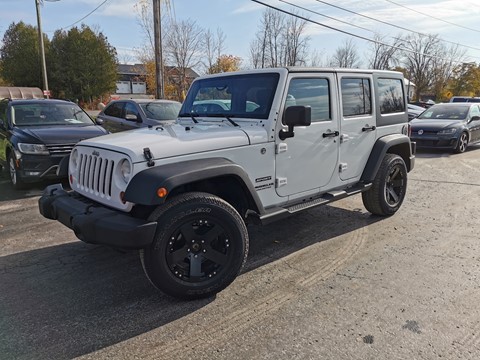 Photo of 2013 Jeep Wrangler Unlimited Sport for sale at Patterson Auto Sales in Madoc, ON