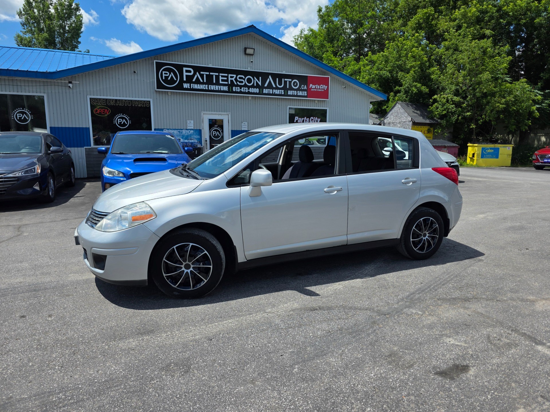 Brilliant Silver Metallic 2009 Nissan Versa Sedan Front-Wheel Drive 4-Speed Automatic