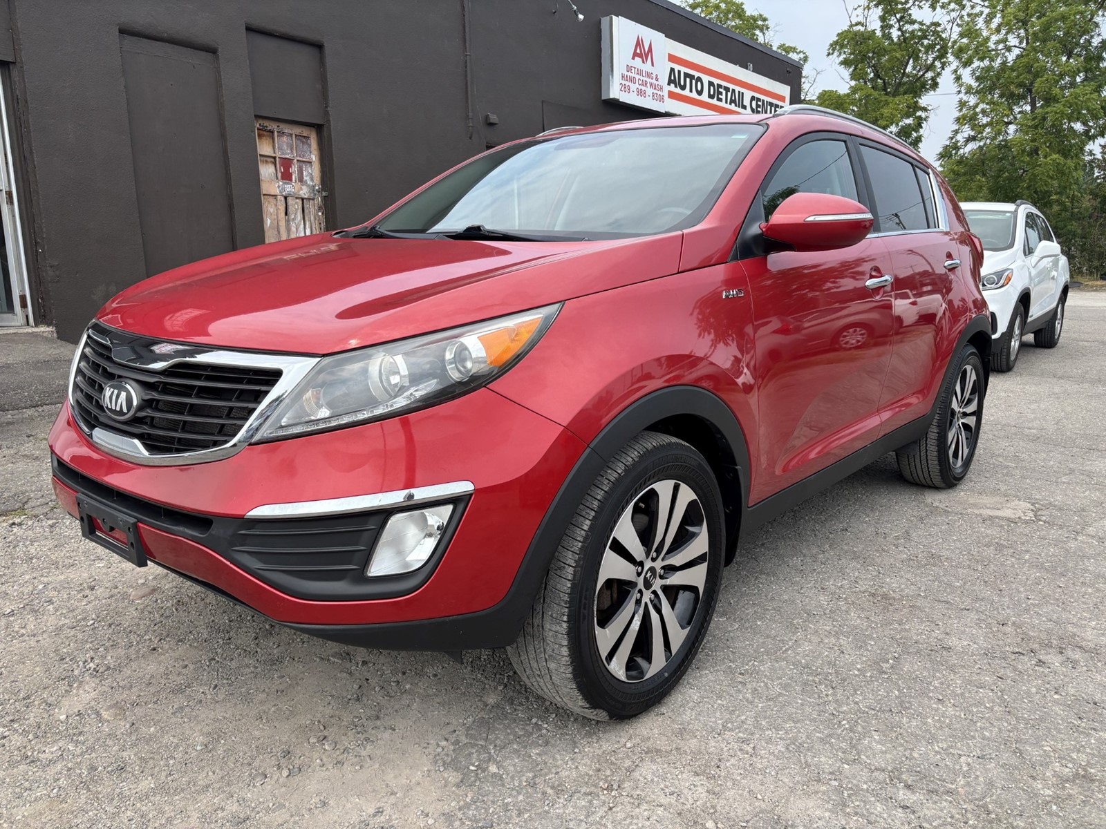 Photo of 2013 KIA Sportage EX AWD for sale at The Car Shoppe in Whitby, ON