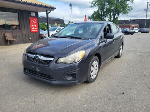Photo d'une 2012 Subaru Impreza   à vendre chez Kenny Laval à Laval, QC