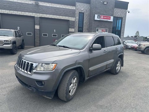Photo d'une 2012 Jeep Grand Cherokee  Laredo   à vendre chez Kenny Drummondville à Drummondville, QC
